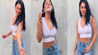 Neeru Bajwa Stuns in Chic White Top and Denim Ensemble!