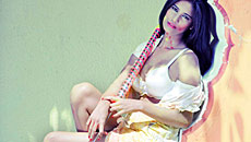 Holi Titillation:An excuse to show wet women with heaving bosoms?