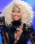 Nicki Minaj accepts the award for favorite rap/hip hop artist at the 40th American Music Awards in Los Angeles