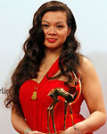 Tina K. the sister of a victim of crime poses with the trophy for Intergration during Bambi Awards 2012 in Duesseldorf