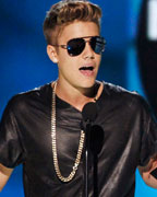 Justin Bieber accepts the 'Milestone Award' onstage during the Billboard Music Awards at the MGM Grand Garden Arena in Las Vegas, Nevada