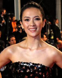 Jury member of Film selection 'Un Certain Regard' actress Zhang Ziyi poses on the red carpet as she arrives for the screening of the film 'Only God Forgives' in competition during the 66th Cannes Film Festival