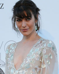 Actress Milla Jovovich arrives for amfAR's Cinema Against AIDS 2013 event in Antibes during the 66th Cannes Film Festival