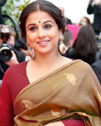 Jury Member actress Vidya Balan poses on the red carpet as she arrives for the screening of the film 'Inside Llewyn Davis' in competition during the 66th Cannes Film Festival