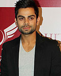 Virat Kohli at Dhoni Unveils Mahi Racing Team