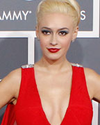 Singer Kaya Jones poses as she arrives at the 55th annual Grammy Awards in Los Angeles, California