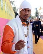 Actor Nick Cannon arrives at the 2013 Kids Choice Awards in Los Angeles, California