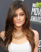 Socialite Kim Kardashian and Kylie Jenner arrive at the 2013 MTV Movie Awards in Culver City, California