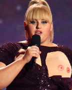 Host Rebel Wilson performs a comedy introduction at the 2013 MTV Movie Awards in Culver City, California