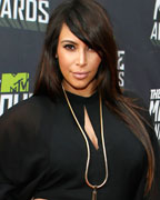 Kim Kardashian arrives at the 2013 MTV Movie Awards in Culver City, California