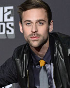 Macklemore and Ryan Lewis pose backstage at the 2013 MTV Movie Awards in Culver City, California