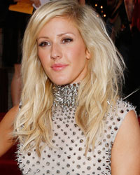 Singer Ellie Goulding poses as she arrives for the 2013 MTV Video Music Awards in New York