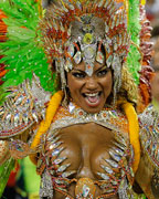 A reveller of Portela samba school participates in the annual Carnival parade in Rio de Janeiro's Sambadrome
