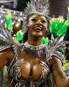Drum Queen Camila Silva of the Mocidade Independente samba school dances on the first night of the annual Carnival parade in Rio de Janeiro's Sambadrome