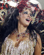 'Drum Queen' Patricia Nery of the Portela samba school dances in the annual Carnival parade in Rio de Janeiro's Sambadrome