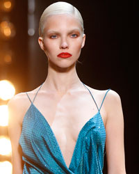 A model presents a creation by French designer Alexandre Vauthier as part of his Haute Couture Spring-Summer 2014 fashion show in Paris