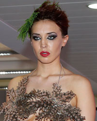 A model presents a creation made entirely from plants, from the Florina collection during Liverpool Fashion Week in northern England