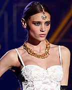 A model presents a creation during the Etam Live Show Lingerie at Bourse du Commerce during Paris fashion week