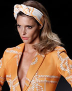 A model presents a creation from the Forum 2013-2014 summer collection during Sao Paulo Fashion Week