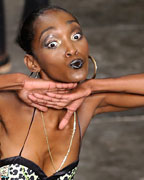 Models present creations from the Cavalera 2013-2014 summer collection during Sao Paulo Fashion Week