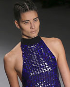 A model presents a creation from the Tufi Duek 2013-2014 summer collection during Sao Paulo Fashion Week
