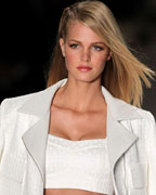 Model Erin Heatherton of the U.S. presents a creation from Colcci's 2013-2014 summer collection during Sao Paulo Fashion Week