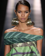 A model presents a creation from the Agua de Coco 2013-2014 summer collection during Sao Paulo Fashion Week