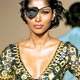 An Indian model presents a creation from fashion designer Rina Dhaka during the Bridal Asia 2005 fashion show 