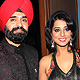 Charan Singh Sapra and Mahi Gill Charan Singh Sapra and Mahi Gill