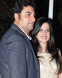 Farzad Billimoria and Amy Billimoria with their daughter Aareyane