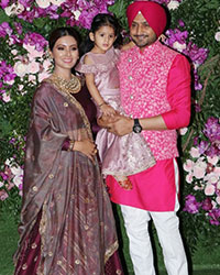 Geeta Basra and Harbhajan Singh with their daughter