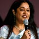 Kirron Kher accepts an award for best supporting actress for her performance in Rang De Basanti