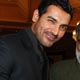 John Abraham with his parents