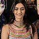 Sonam Kapoor poses with members of a circus during the 10th IIFA weekend in Macau