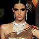 Model presents a creation from D`damas at the Fashion Extravaganza during the 10th IIFA weekend in Macau