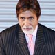 Amitabh Bachchan makes a hand print for the Dubai Studio City as its manager Jamal Al- Sharif and the staff