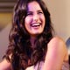 Katrina Kaif and Anil Kapoor laugh during a talk show at the International Indian Film Academy foundation charity event