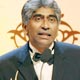 Ashok Amritraj speaks after receiving best international achievment award at 7th International Indian Film Academy awards in Dubai