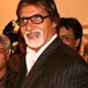 Amitabh launches ace lensman Rajan Chaugle`s Bollywood`s candid pics exhibition