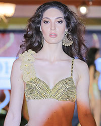 A model walks the ramp for Designer Rohit Verma during the launch of Stage- Lounge- Kitchen - SIN CITY