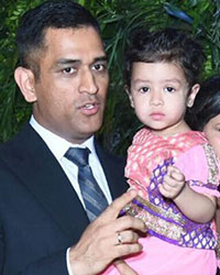 Mahendra Singh Dhoni and Sakshi with their daughter Ziva