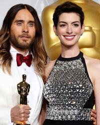 Jared Leto, best supporting actor for his role in 'Dallas Buyers Club,' poses with presenter Anne Hathaway at the 86th Academy Awards