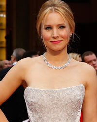 Actress Kristen Bell arrives on the red carpet at the 86th Academy Awards in Hollywood, California