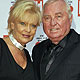 German boxing coach Ulli Wegner and his wife Margit arrive for the 'Ein Herz fuer Kinder' (A Heart for Children) TV charity telethon in Berlin