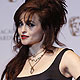 Helena Bonham Carter poses for photographers at the British Academy of Film and Arts award ceremony in London