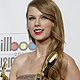 Singer Swift poses in the photo room after winning three Billboard awards during the 2011 Billboard Music Awards show in Las Vegas