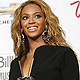 Singer Beyonce poses in the photo room after winning Billboard's Millenium award in Las Vegas