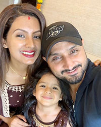 Geeta Basra and Harbhajan Singh with their daughter