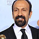Director Asghar Farhadi and actor Peyman Moadi pose with the award for best foreign film for 'Jodaeiye Nader Az Simin', translated as 'A Separation'