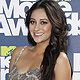 Canadian actress Shay Mitchell arrives at the 2011 MTV Movie Awards in Los Angeles